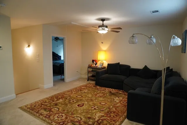 a bathroom with a toilet and a bathtub