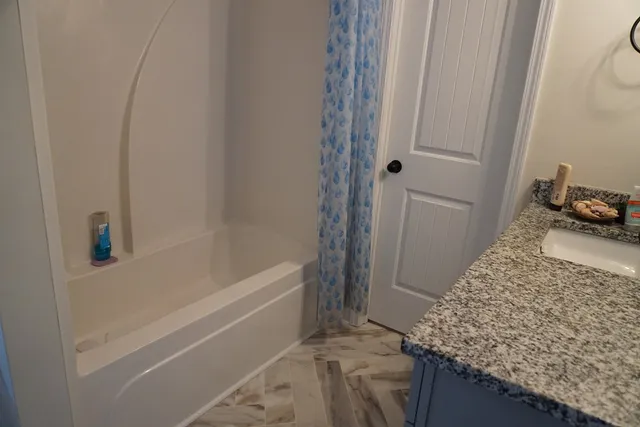 a room with furniture and window