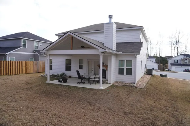 a kitchen with sink cabinets and wooden floor