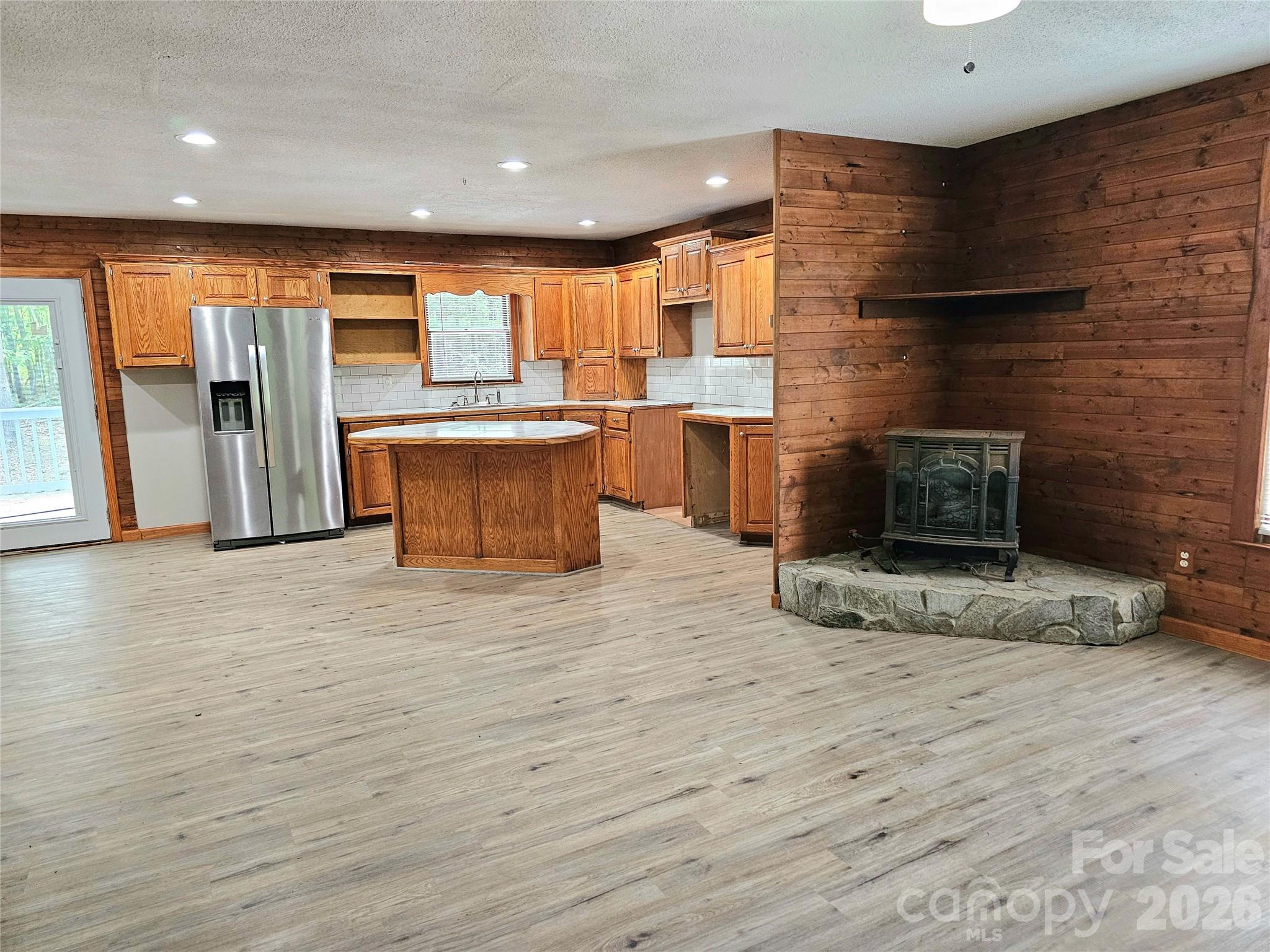 5692 S-141 Great Falls, SC 29055 - Photo 18 of 48 a view of kitchen with furniture and fireplace