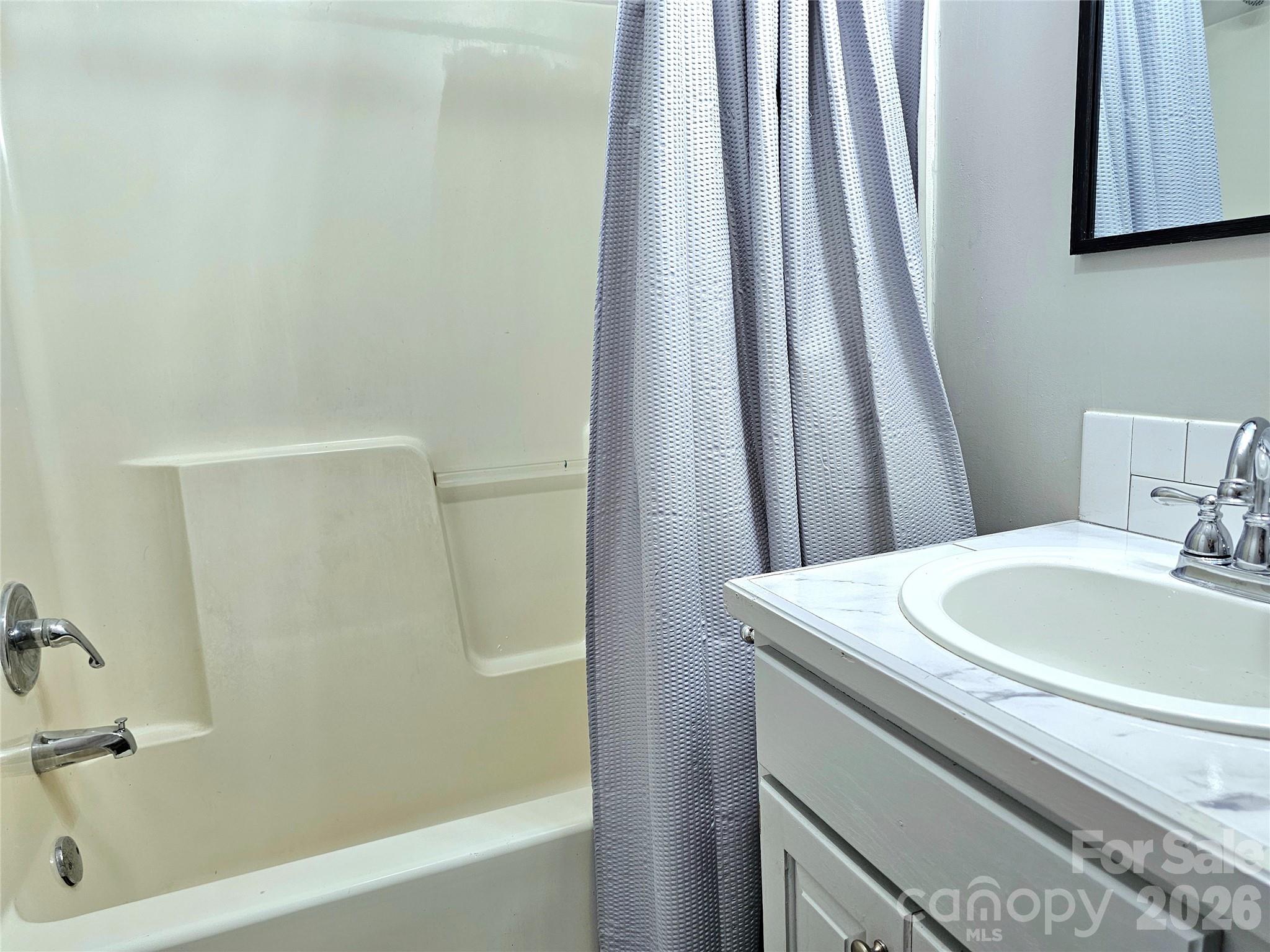 5692 S-141 Great Falls, SC 29055 - Photo 33 of 48 a bathroom with a sink and a mirror