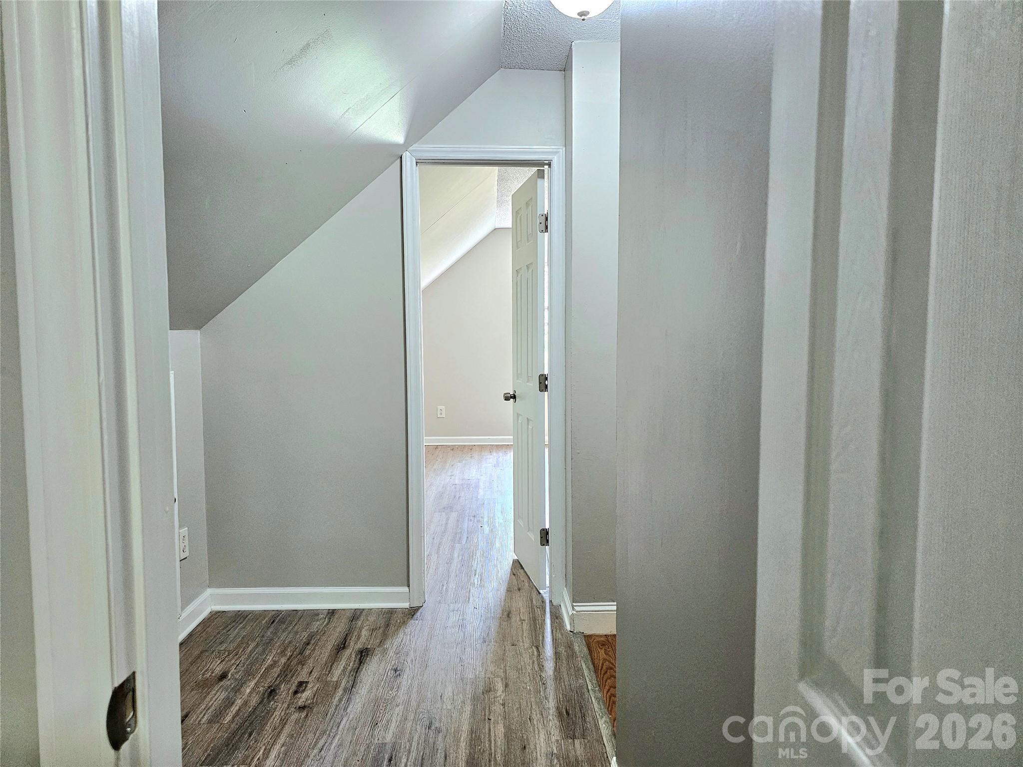 5692 S-141 Great Falls, SC 29055 - Photo 34 of 48 a view of a hallway with wooden floor