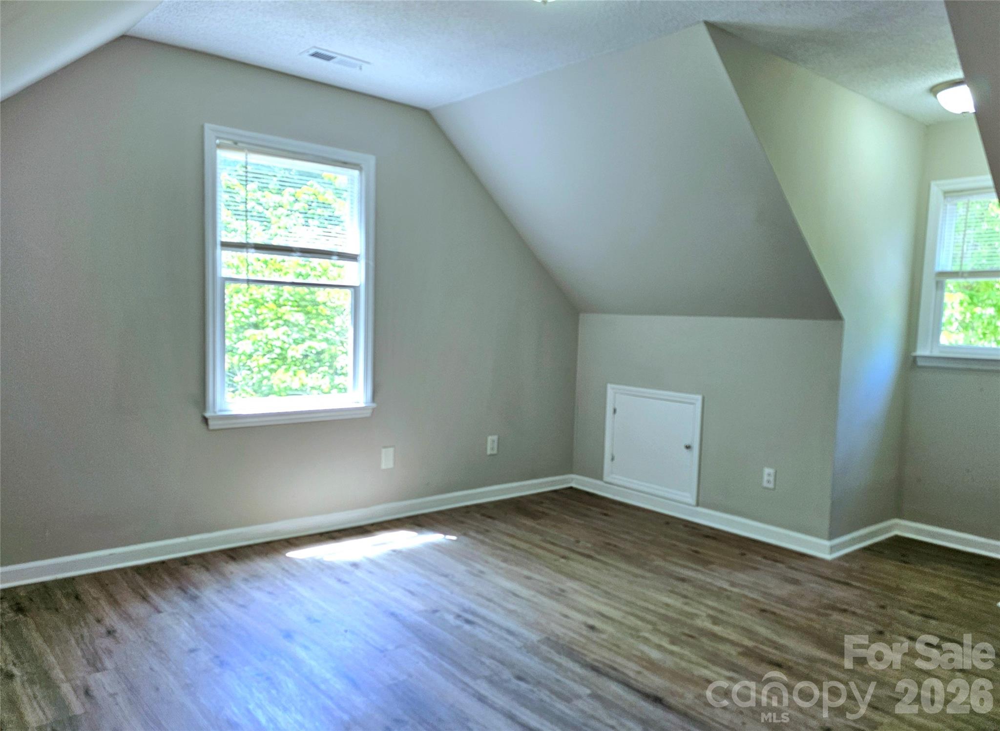5692 S-141 Great Falls, SC 29055 - Photo 35 of 48 an empty room with wooden floor and windows