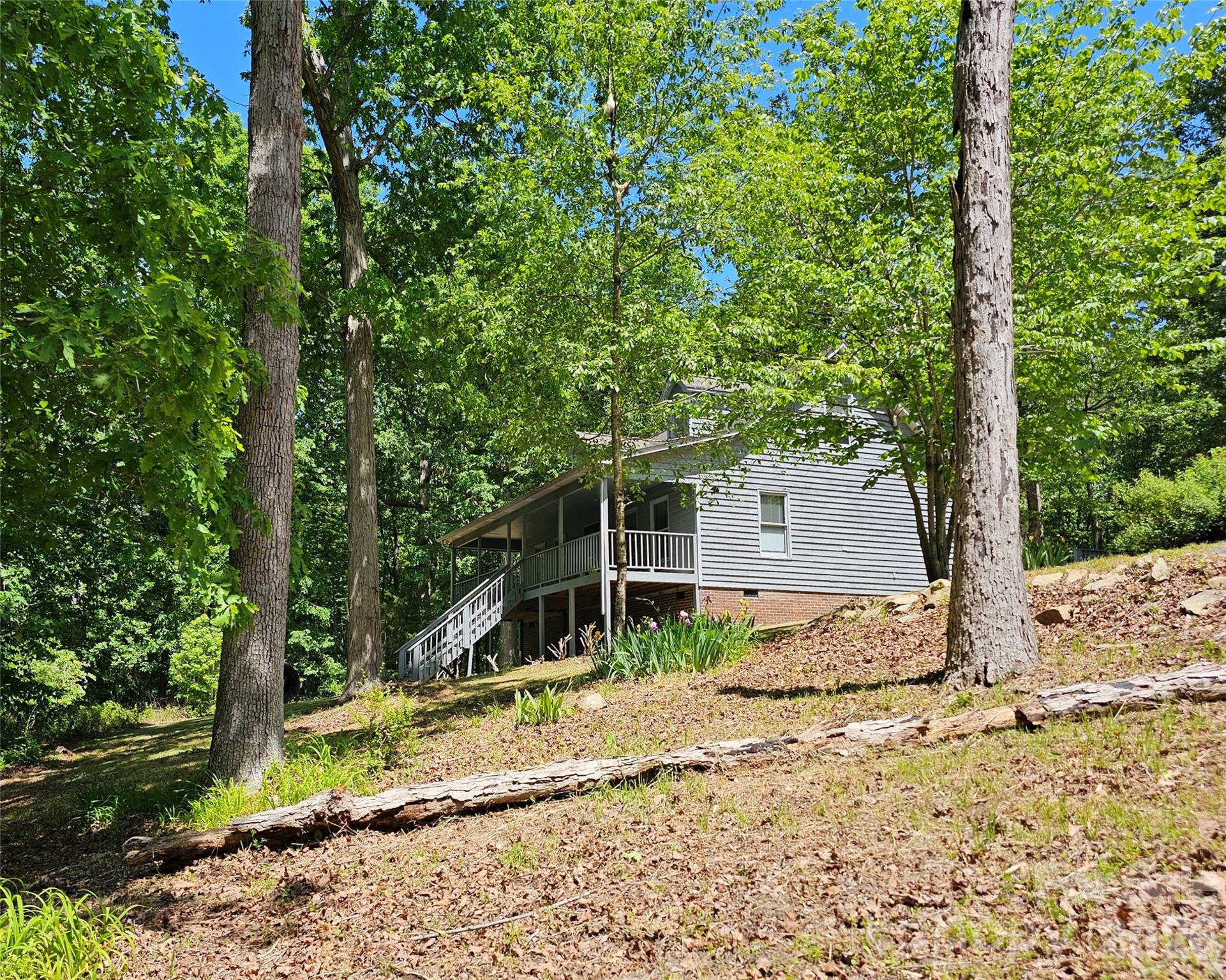 5692 S-141 Great Falls, SC 29055 - Photo 10 of 48 a house with a tree in front of it