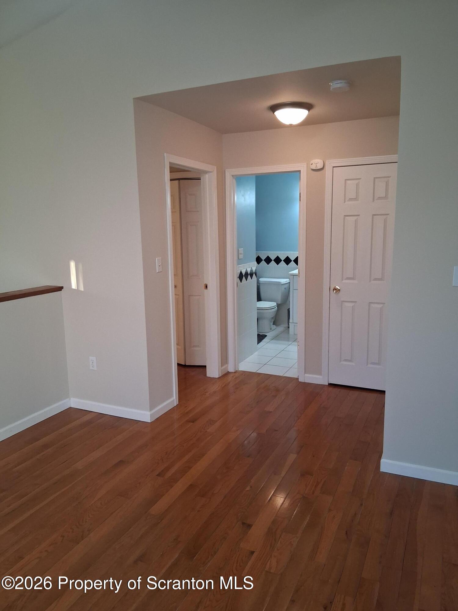 512 South Keyser Avenue Scranton, PA 18504 - Photo 27 of 42 a view of empty room with wooden floor