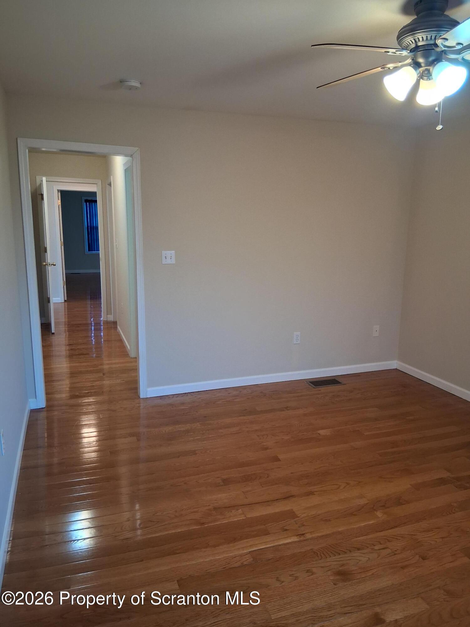512 South Keyser Avenue Scranton, PA 18504 - Photo 29 of 42 a view of a room with wooden floor