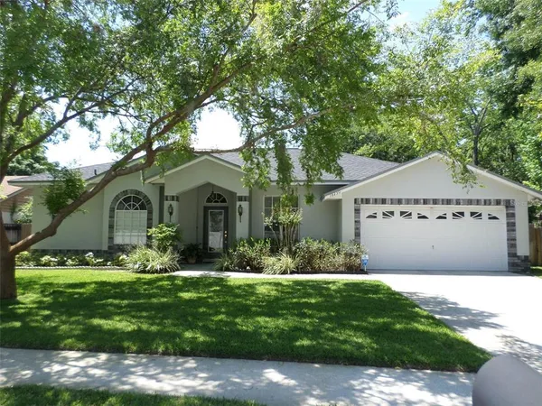 a front view of house with garden