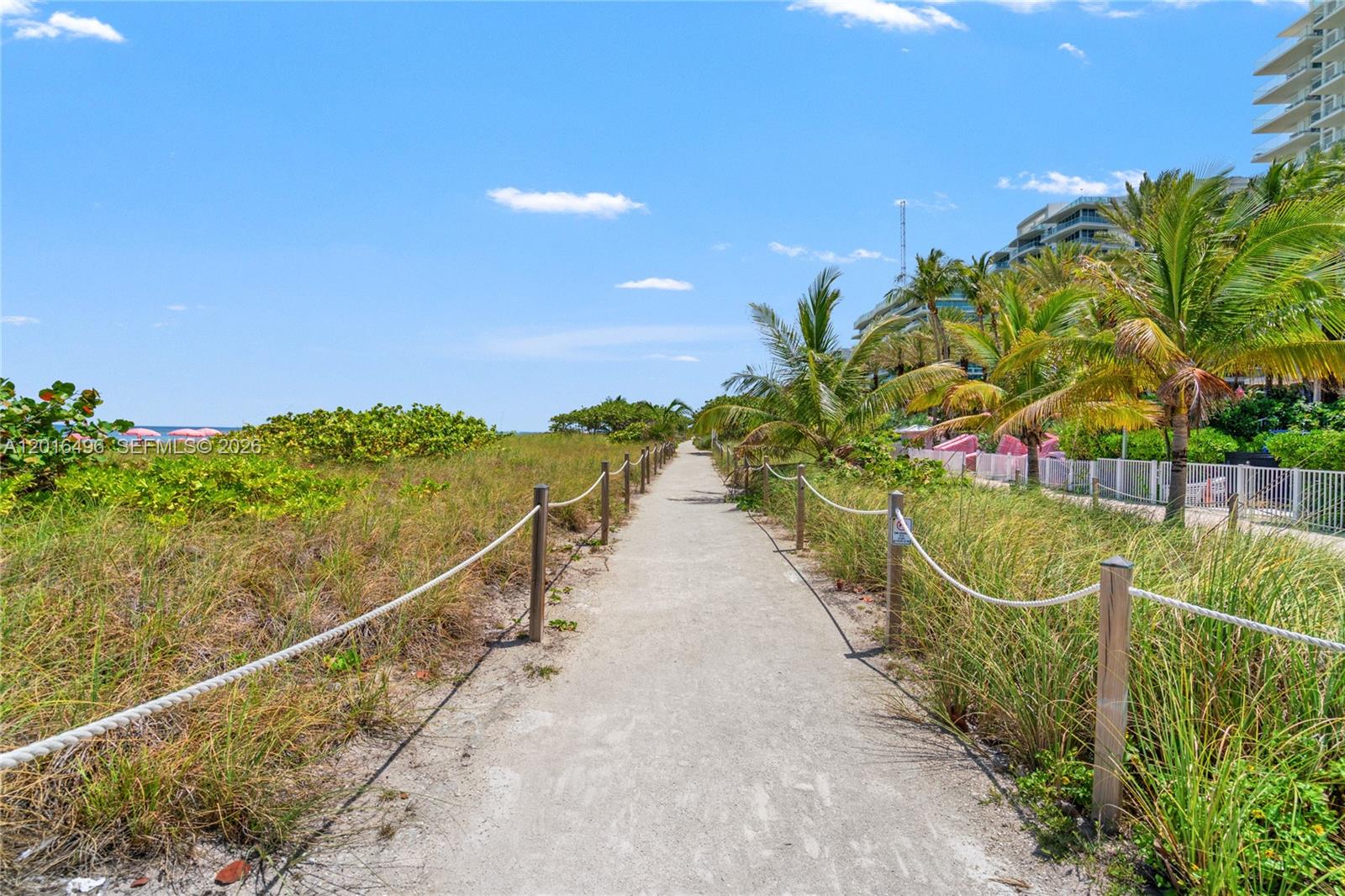 9455 Collins Avenue, Unit 310 Surfside, FL 33154 - Photo 15 of 19 a view of an outdoor space and a yard