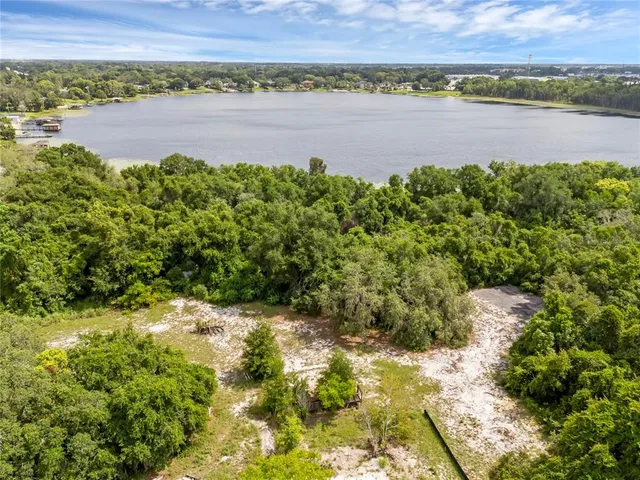 a view of an ocean and a mountain