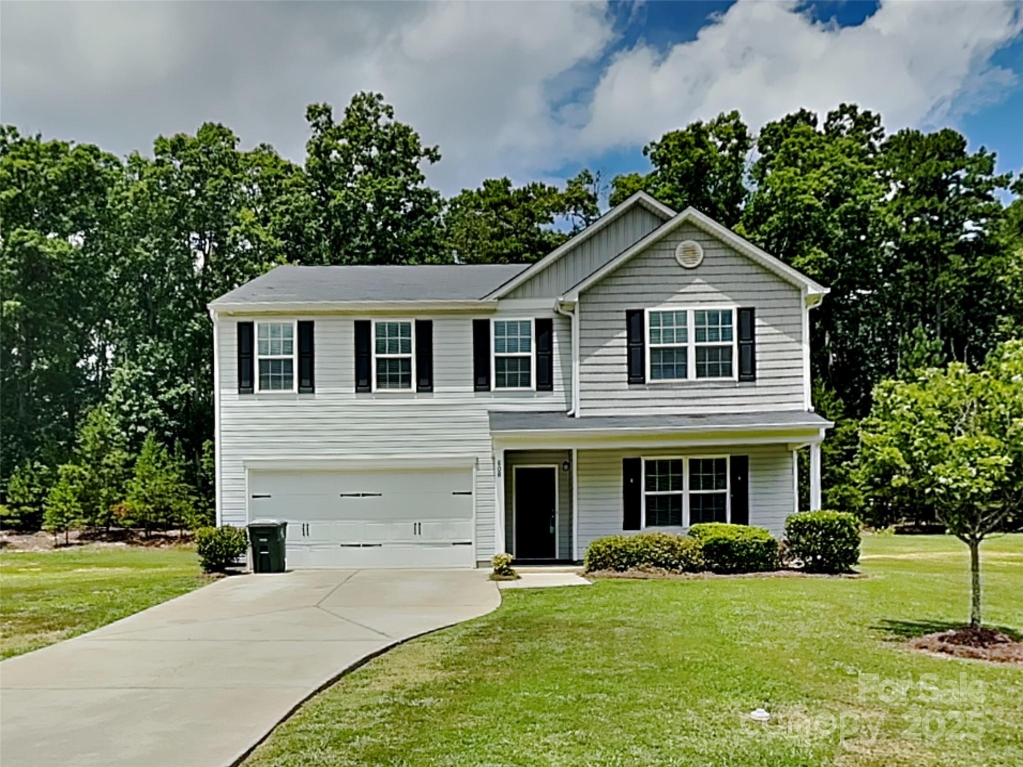 608 Hunley Street Monroe, NC 28112 - Photo 1 of 21 a front view of a house with a yard