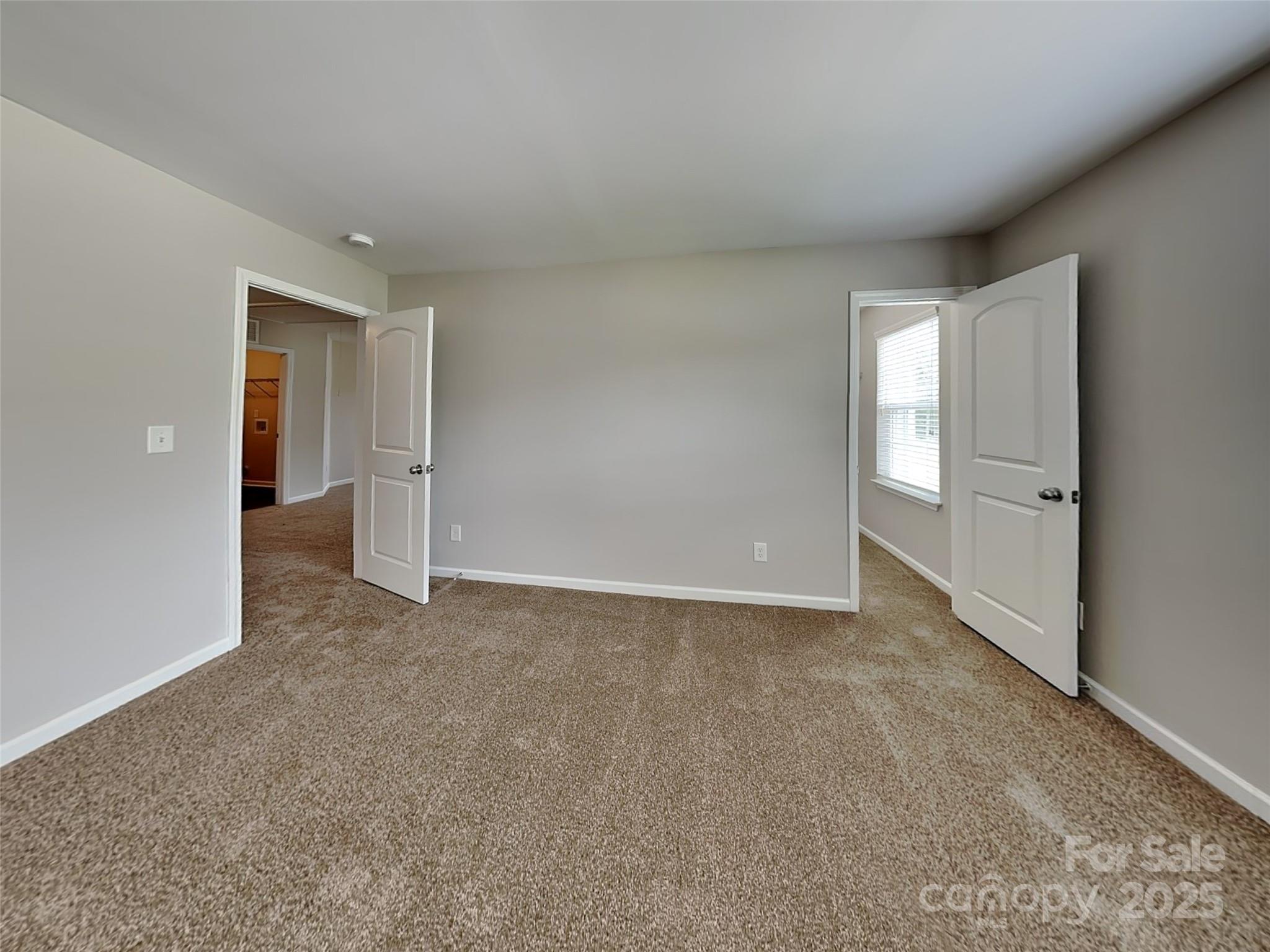608 Hunley Street Monroe, NC 28112 - Photo 18 of 21 a view of an empty room and closet area