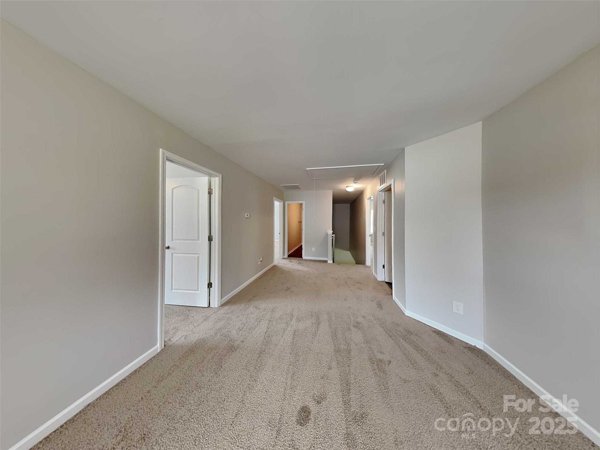 608 Hunley Street Monroe, NC 28112 - Photo 8 of 21 a view of empty room with wooden floor