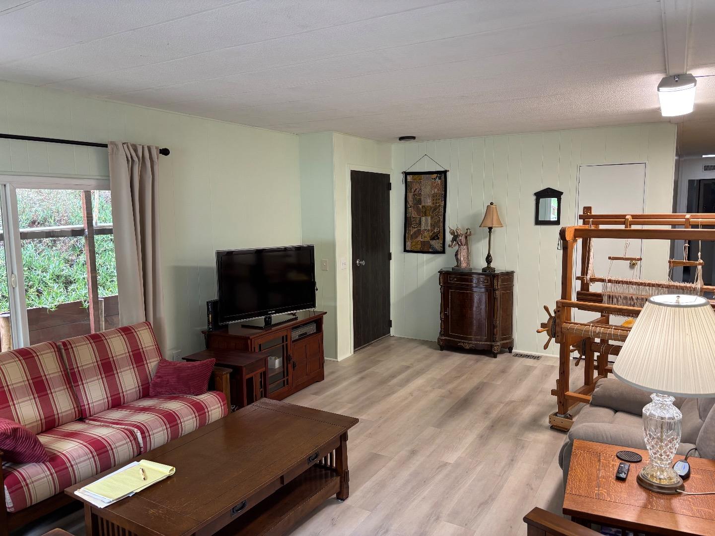 809 Maher Road Salinas, CA 93907 - Photo 15 of 17 a living room with furniture and a flat screen tv