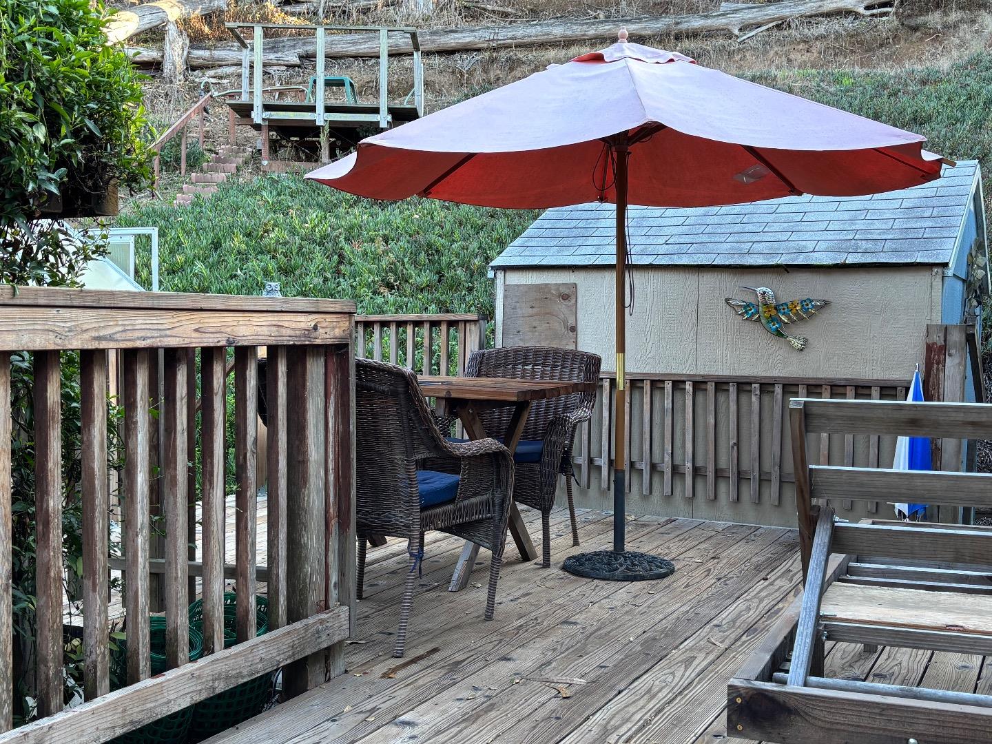 809 Maher Road Salinas, CA 93907 - Photo 4 of 17 a view of a chair and tables in the balcony