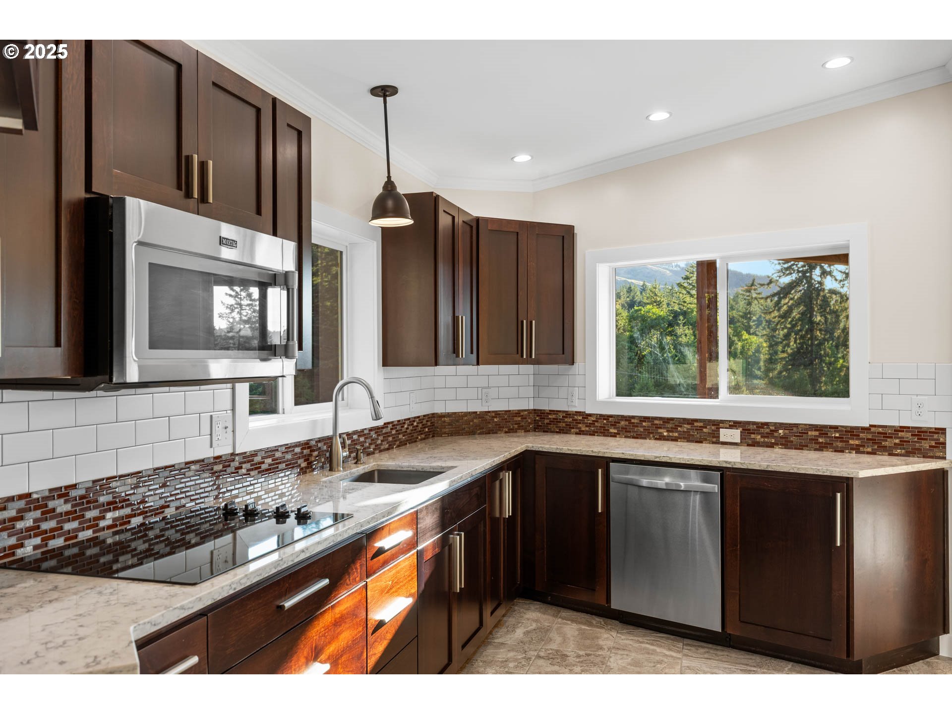 6477 Elkhead Road Yoncalla, OR 97499 - Photo 11 of 35 a kitchen with stainless steel appliances granite countertop a sink stove and cabinets