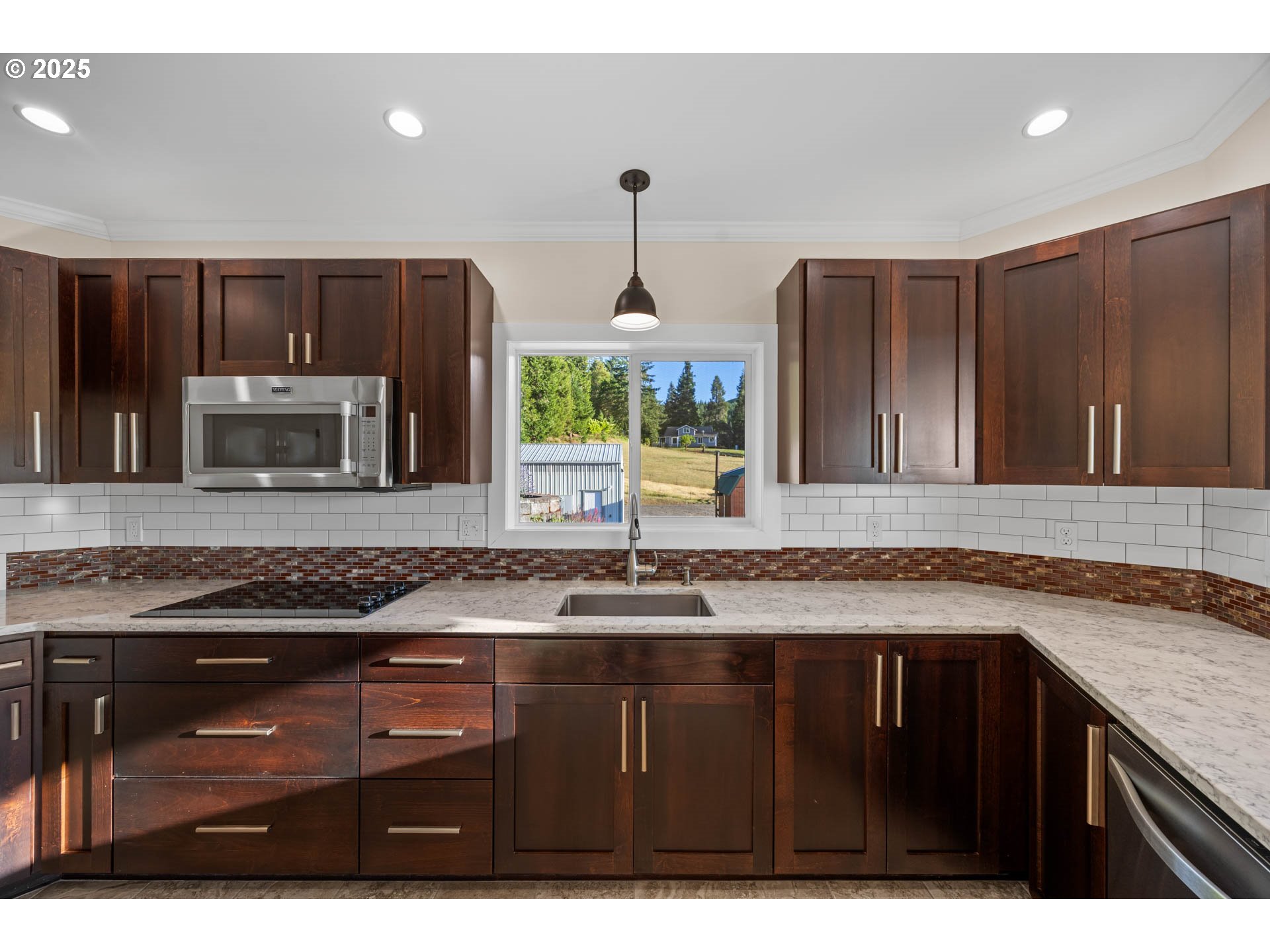 6477 Elkhead Road Yoncalla, OR 97499 - Photo 12 of 35 a kitchen with a sink and cabinets