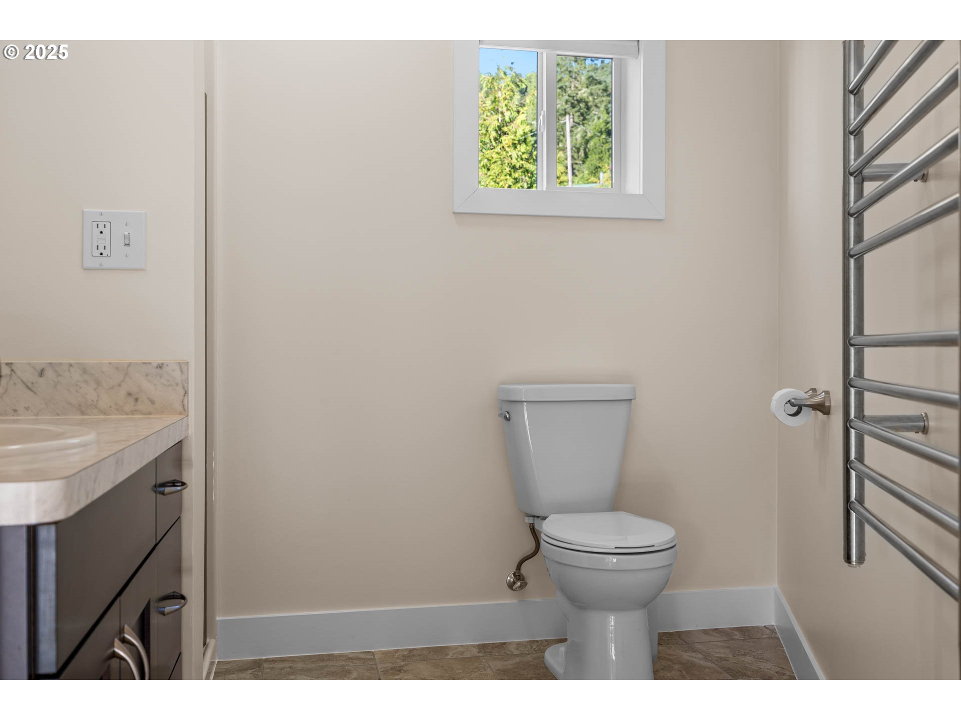 6477 Elkhead Road Yoncalla, OR 97499 - Photo 17 of 35 a bathroom with a toilet and a sink
