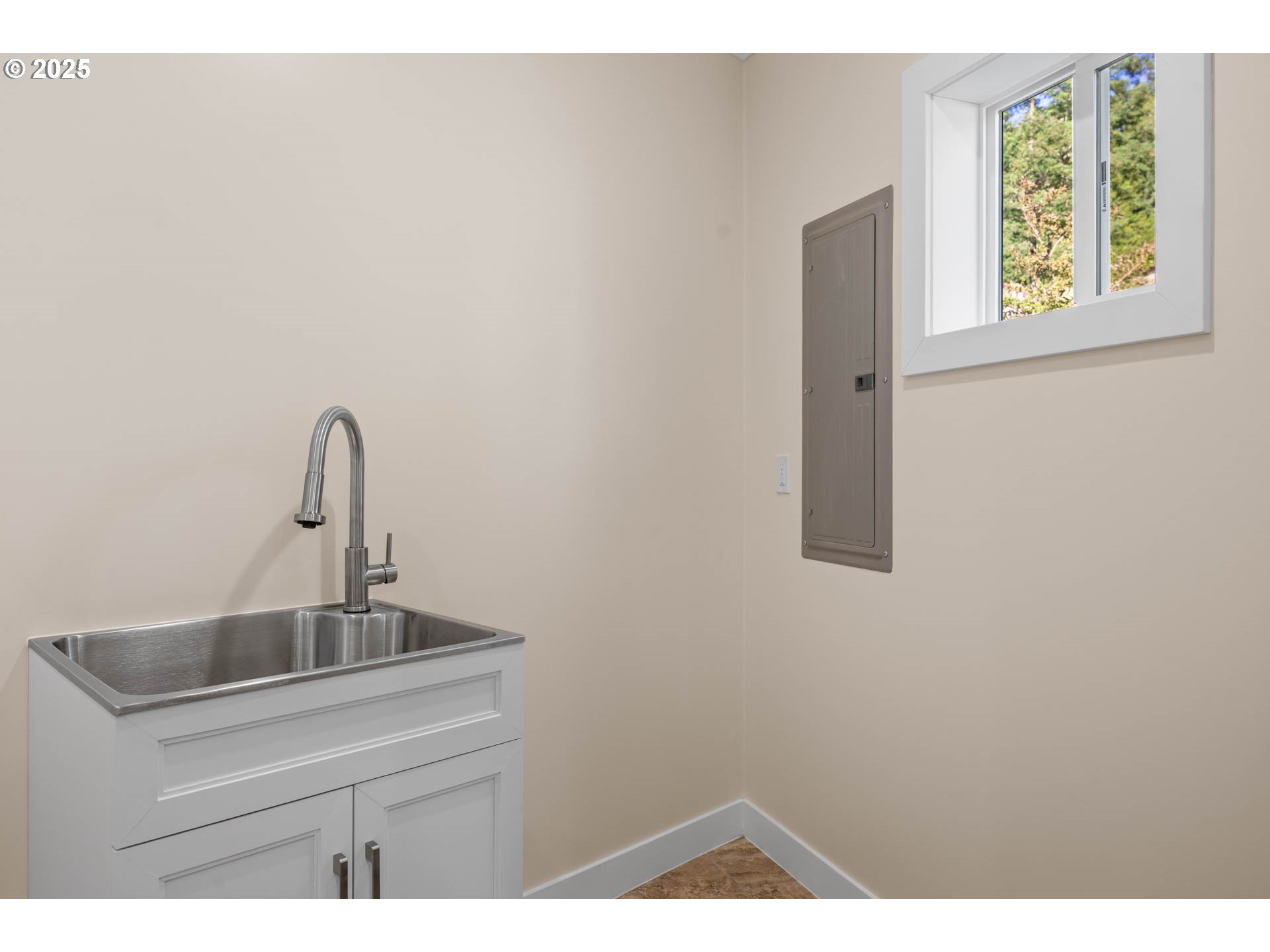 6477 Elkhead Road Yoncalla, OR 97499 - Photo 19 of 35 a close view of a sink and a mirror in a bathroom