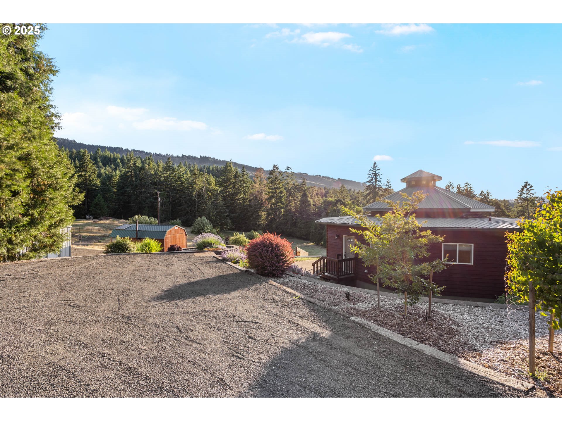 6477 Elkhead Road Yoncalla, OR 97499 - Photo 21 of 35 a view of a terrace with a bench