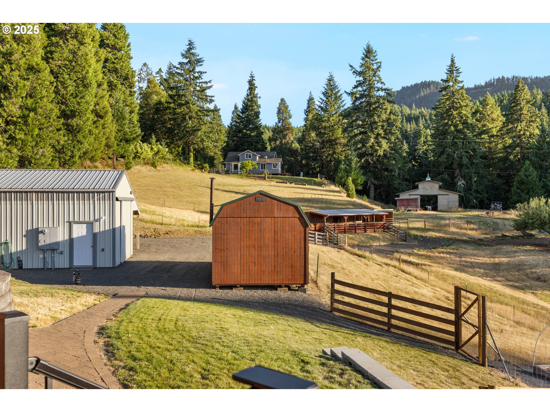6477 Elkhead Road Yoncalla, OR 97499 - Photo 23 of 35 a view of a swimming pool with a patio