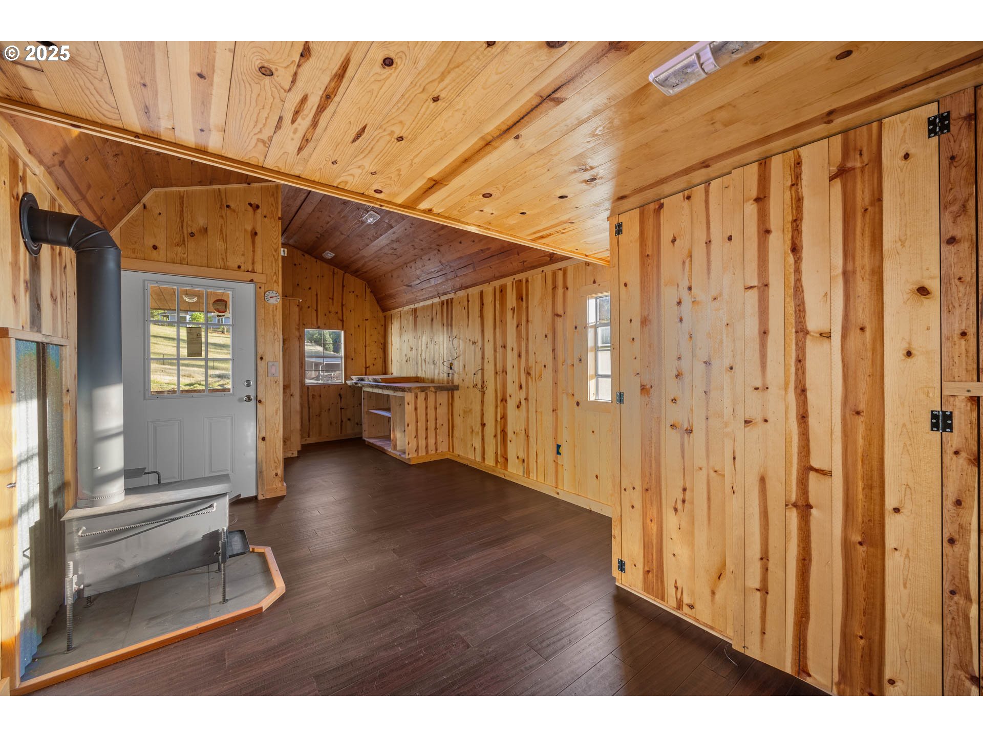 6477 Elkhead Road Yoncalla, OR 97499 - Photo 25 of 35 a view of entryway with wooden floor