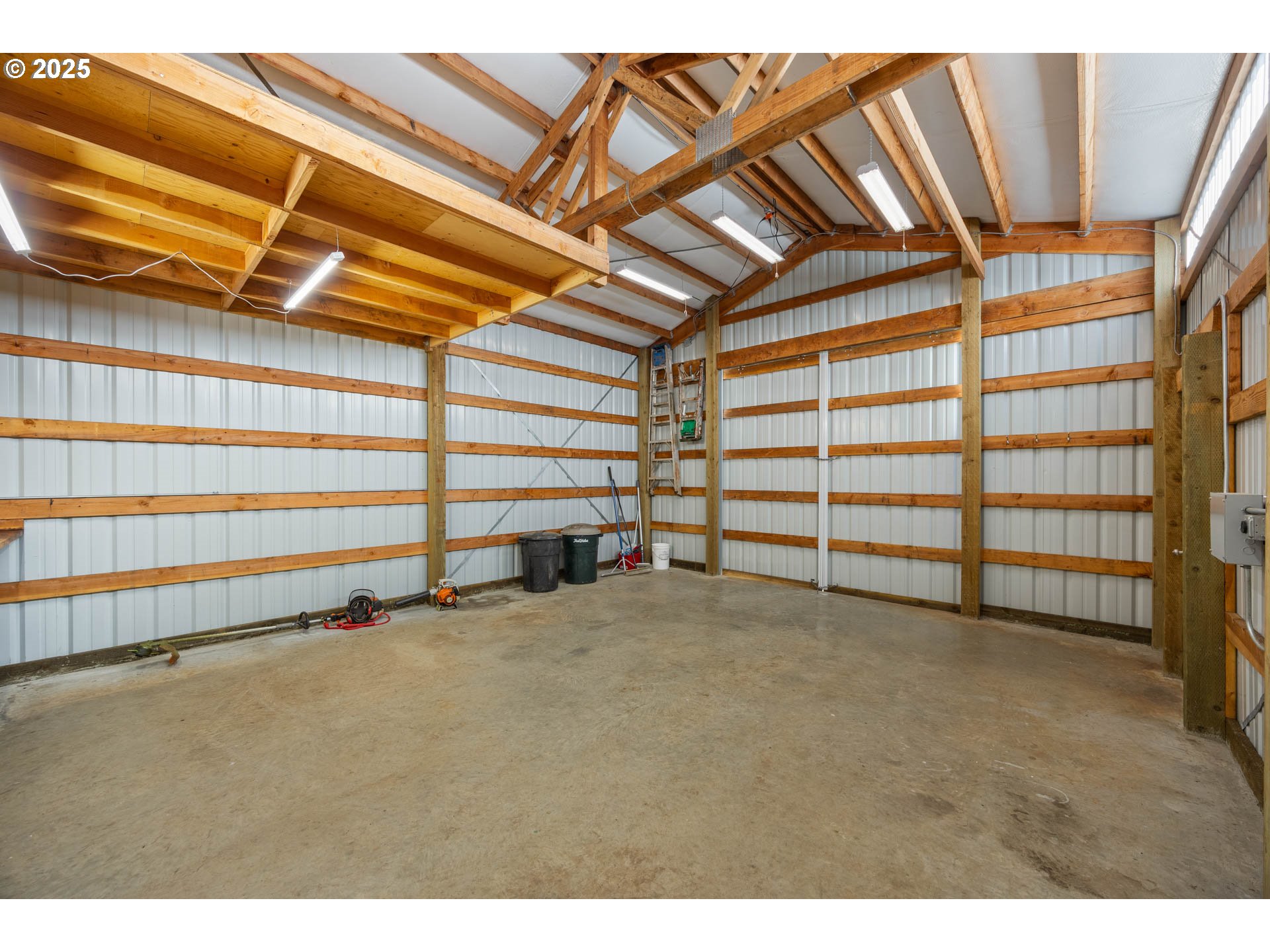 6477 Elkhead Road Yoncalla, OR 97499 - Photo 27 of 35 a view of an empty room with a garage