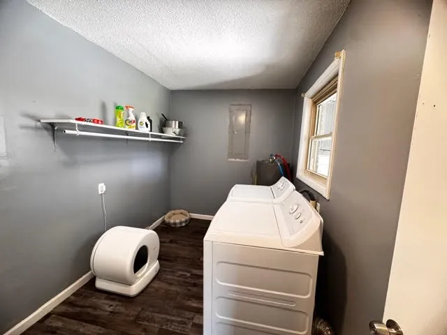 a bathroom with a toilet and a mirror