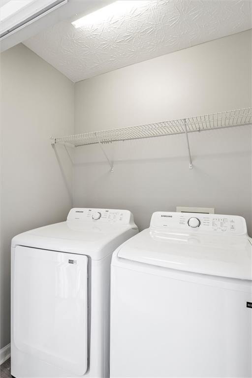 5667 Cascade Run Atlanta, GA 30336 - Photo 19 of 31 a utility room with dryer and washer