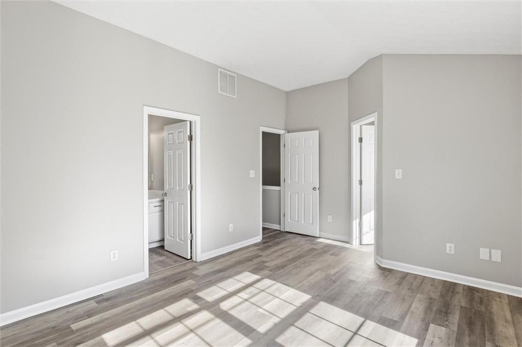 5667 Cascade Run Atlanta, GA 30336 - Photo 21 of 31 a view of a room with a hallway