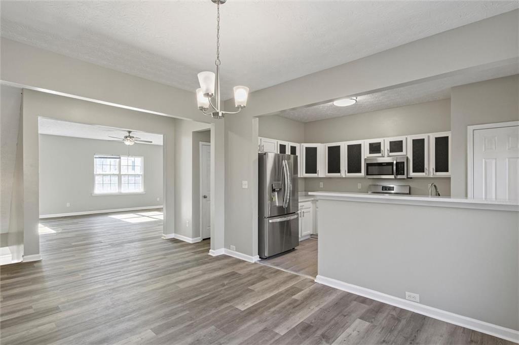 5667 Cascade Run Atlanta, GA 30336 - Photo 9 of 31 a view of a kitchen and a sink