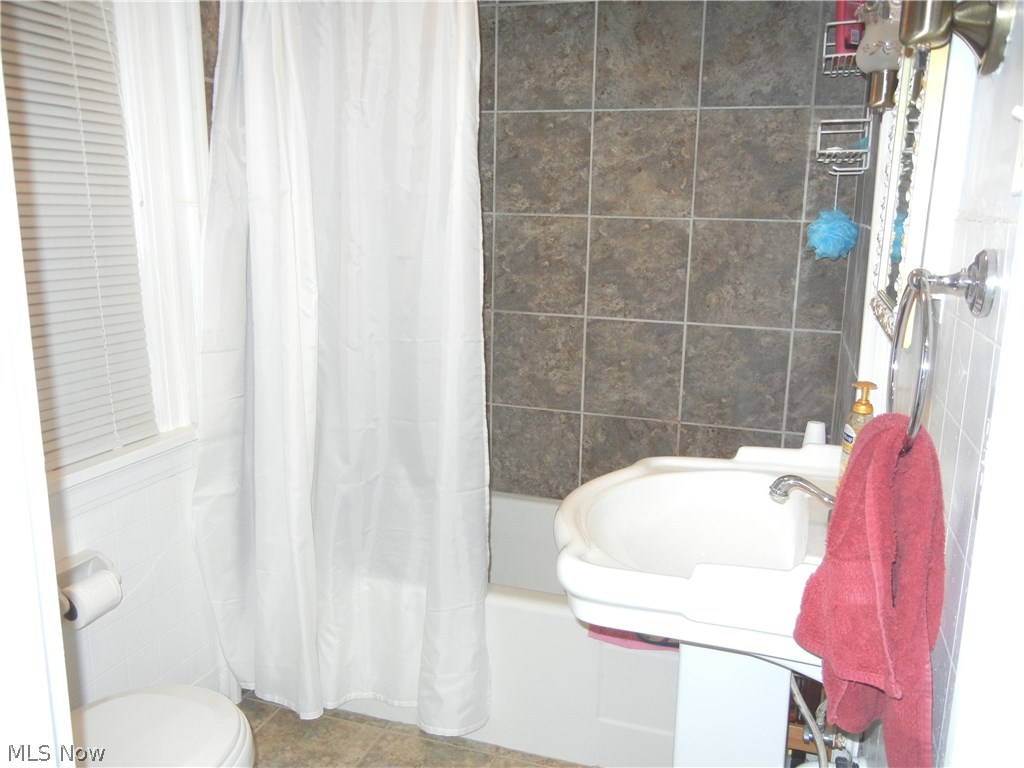 1105 Raff Road Southwest Canton, OH 44710 - Photo 11 of 15 Upstairs with full bath tub and shower.