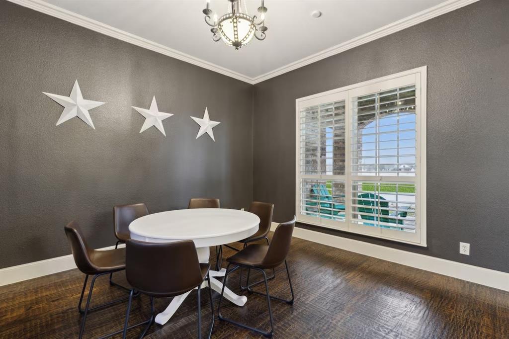 1405 Gateway Boulevard Forney, TX 75126 - Photo 12 of 32 a view of a dining room with furniture window and wooden floor