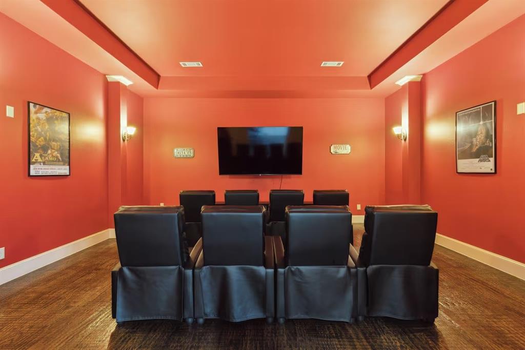 1405 Gateway Boulevard Forney, TX 75126 - Photo 13 of 32 a living room with furniture and a flat screen tv