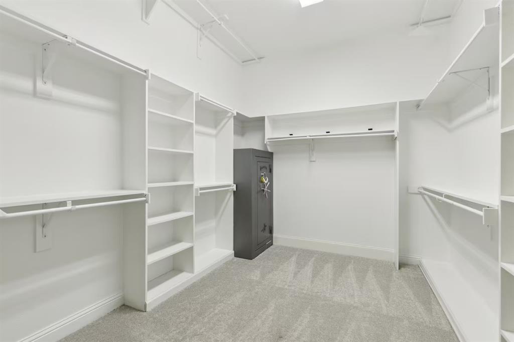 1405 Gateway Boulevard Forney, TX 75126 - Photo 20 of 32 a view of an empty walk in closet