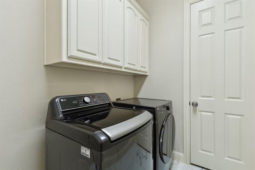 1405 Gateway Boulevard Forney, TX 75126 - Photo 29 of 32 a close up of a washing machine