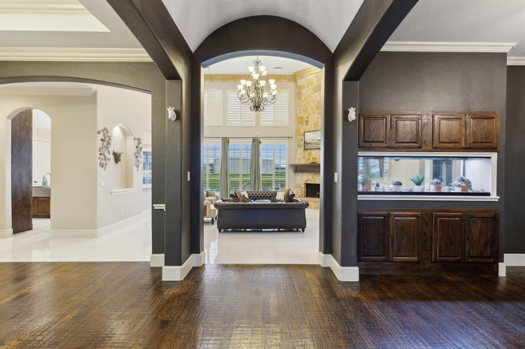 1405 Gateway Boulevard Forney, TX 75126 - Photo 5 of 32 a view of an entryway with wooden floor