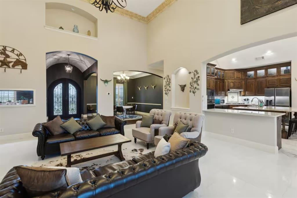 1405 Gateway Boulevard Forney, TX 75126 - Photo 6 of 32 a living room with furniture and wooden floor