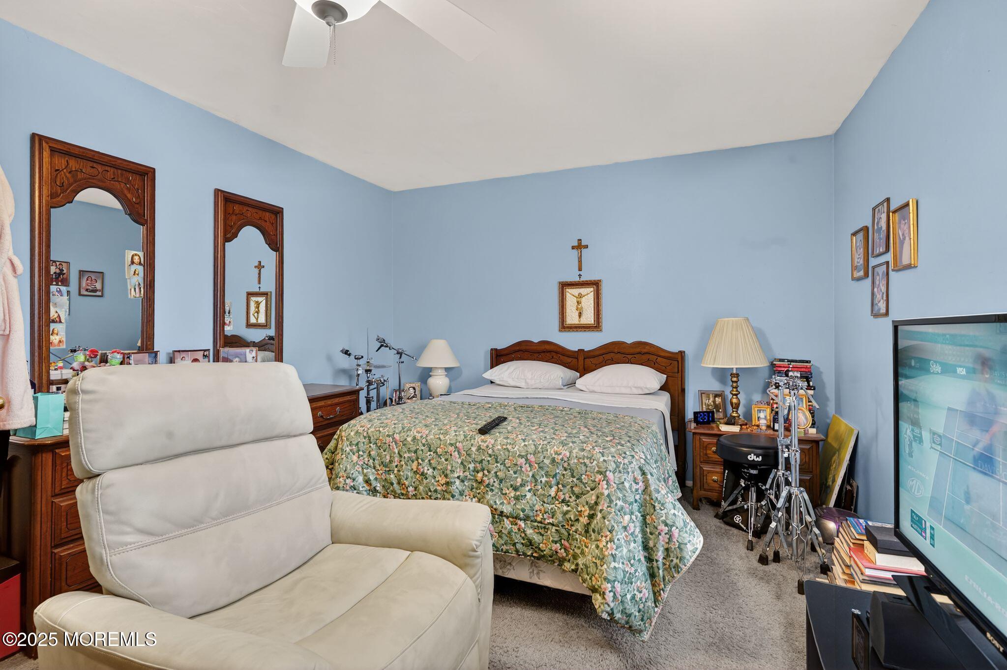 3 Timberline Drive Howell, NJ 07731 - Photo 17 of 21 a bedroom with furniture and a chandelier