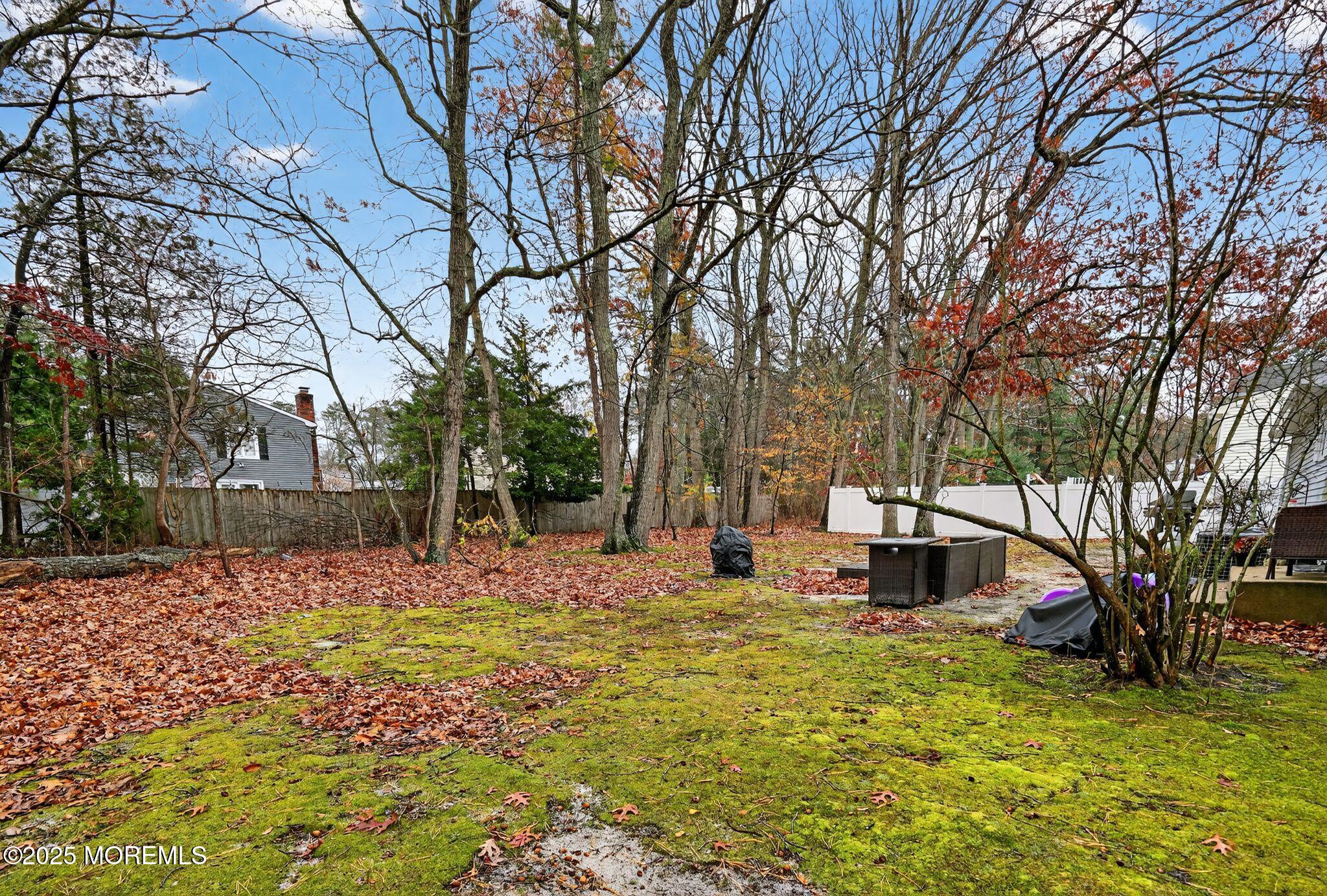 3 Timberline Drive Howell, NJ 07731 - Photo 2 of 21 a view of a yard with a house and large trees