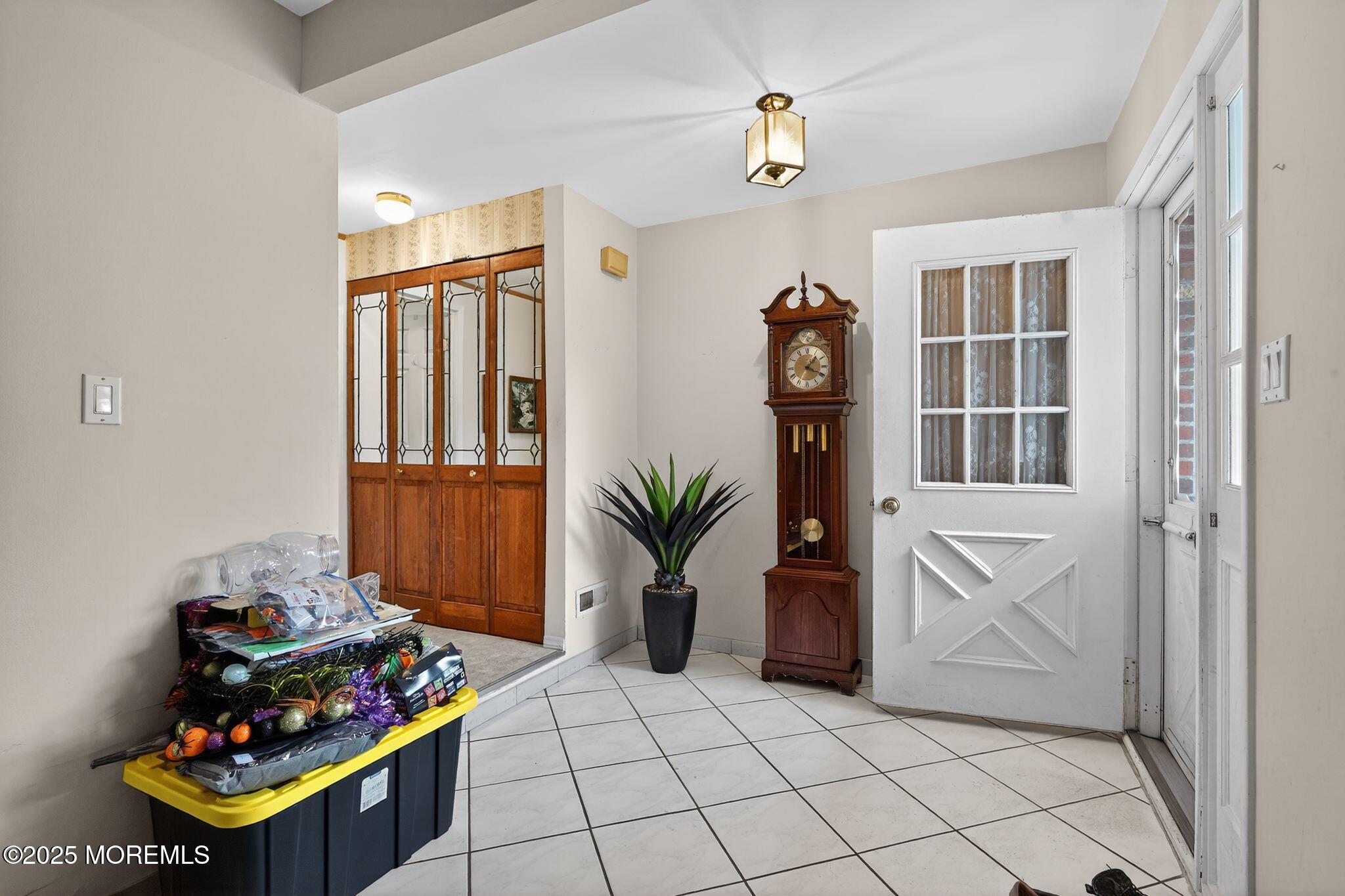 3 Timberline Drive Howell, NJ 07731 - Photo 8 of 21 a room with furniture and flower pot