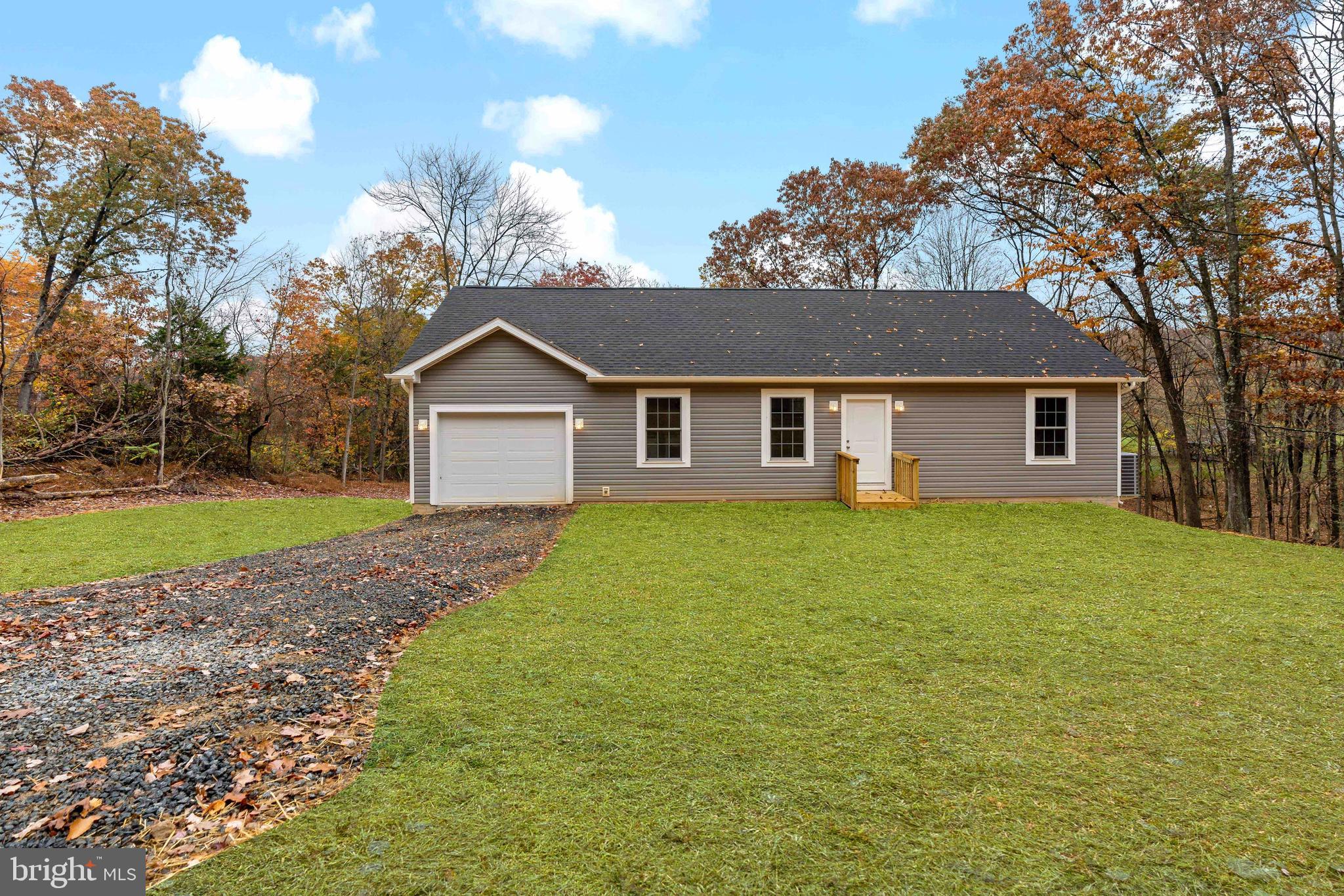 1601 Tabor Road Berkeley Springs, WV 25411 - Photo 1 of 22 Beautiful Rancher with a full unfinished basement