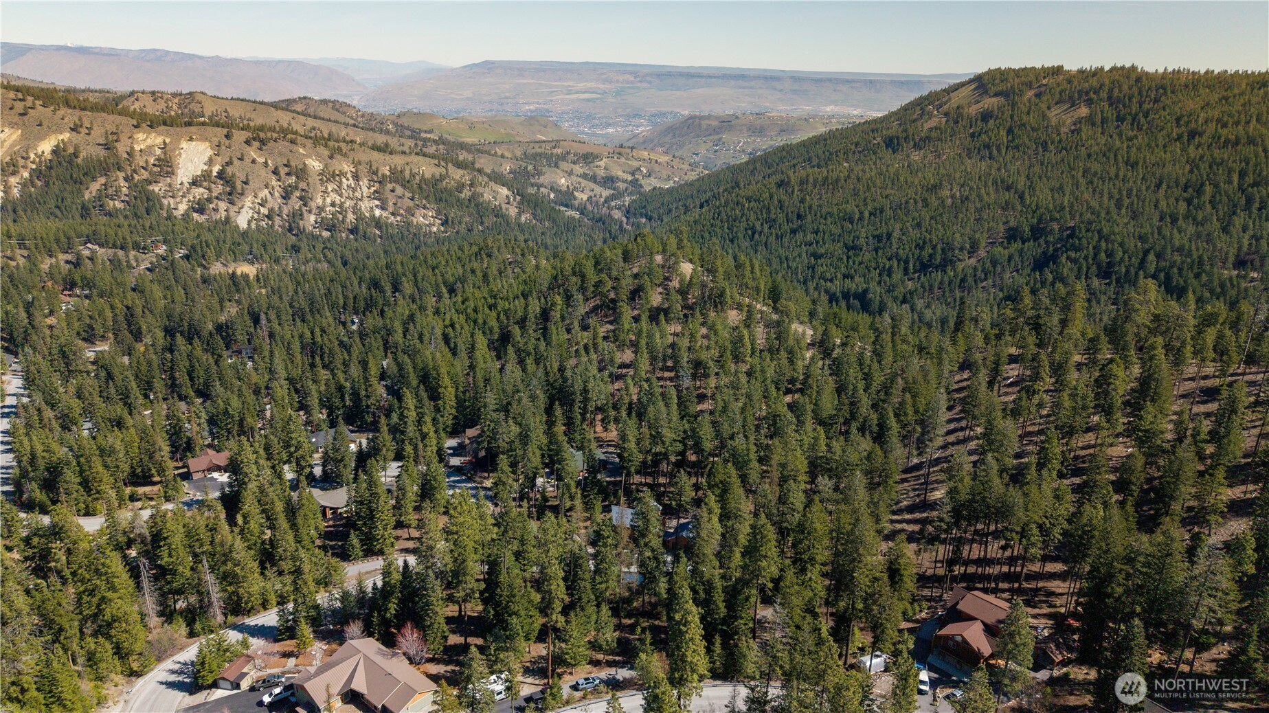 6761 Forest Ridge Drive Wenatchee, WA 98801 - Photo 8 of 14 a view of a city with a mountain