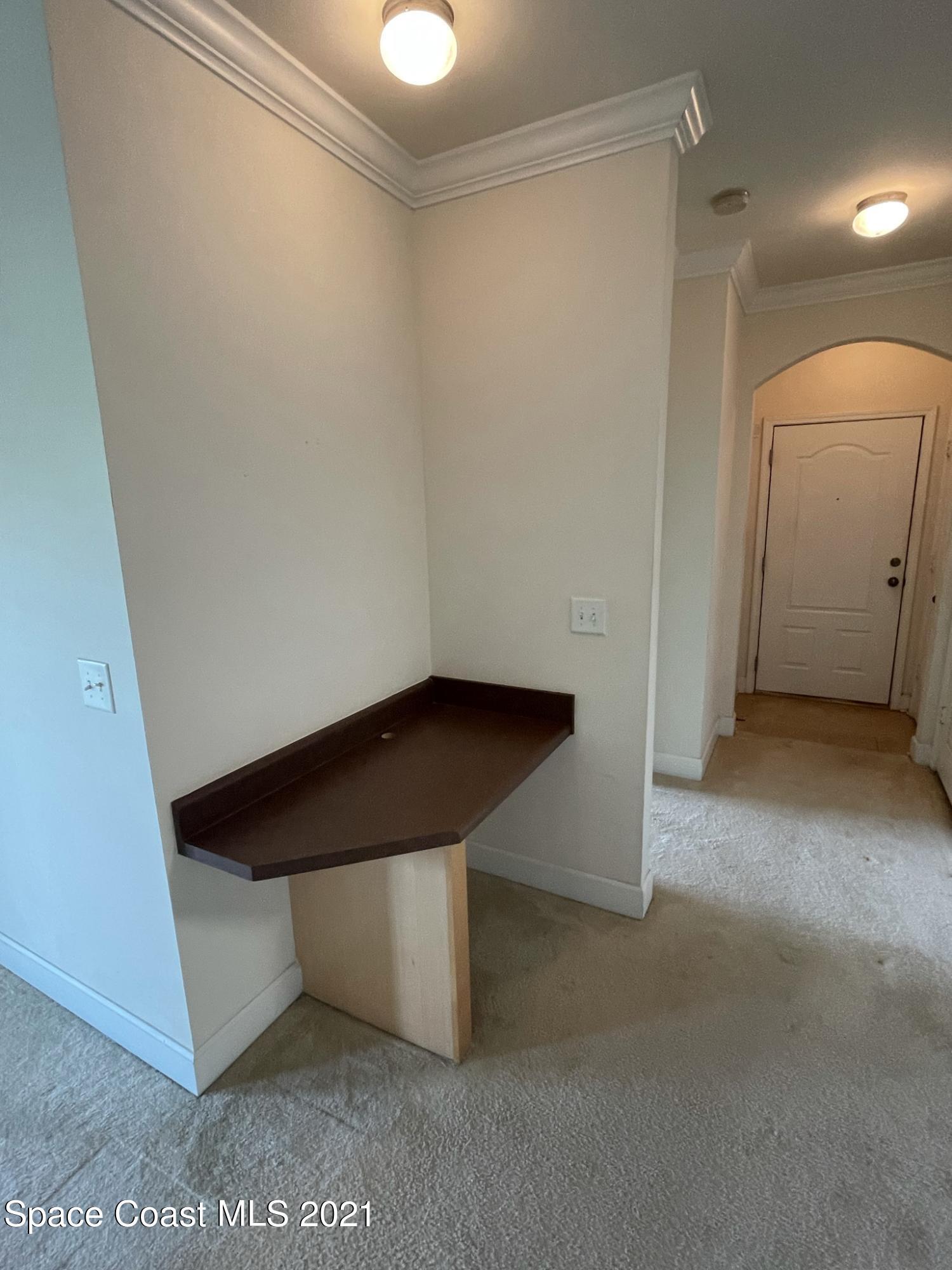 6411 Borasco Drive, Unit 319 Melbourne, FL 32940 - Photo 16 of 27 a view of entryway