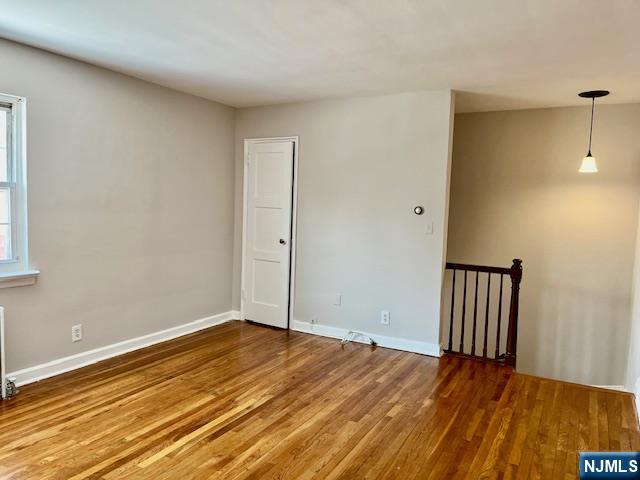 285 Teaneck Road, Unit 285B Ridgefield Park, NJ 07660 - Photo 12 of 12 a view of an empty room with wooden floor