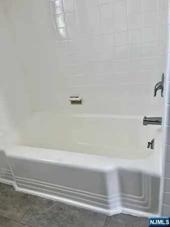 a bathroom with a bathtub