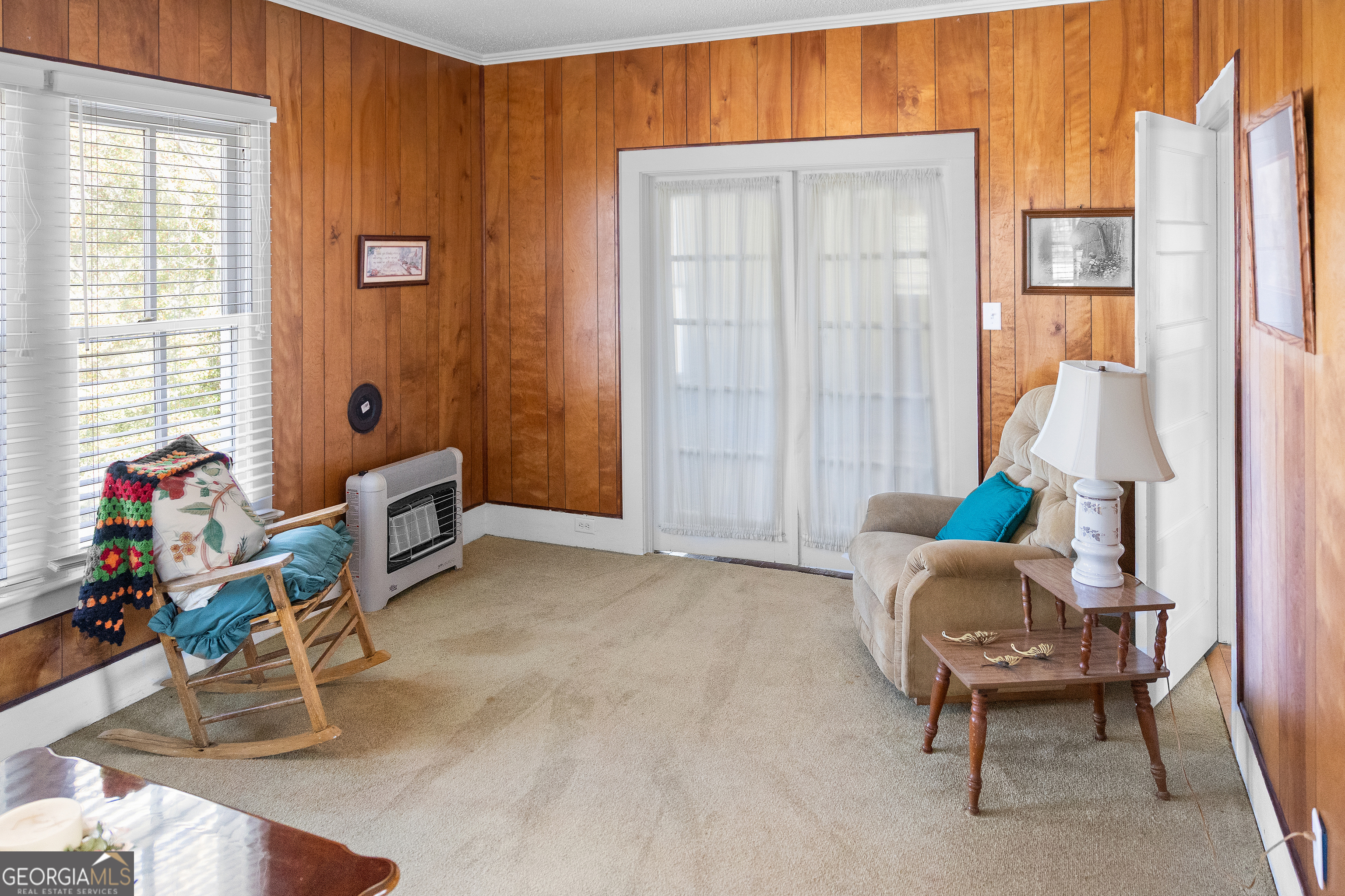 17332 Old River Road North Statesboro, GA 30461 - Photo 20 of 26 a living room with furniture and a window