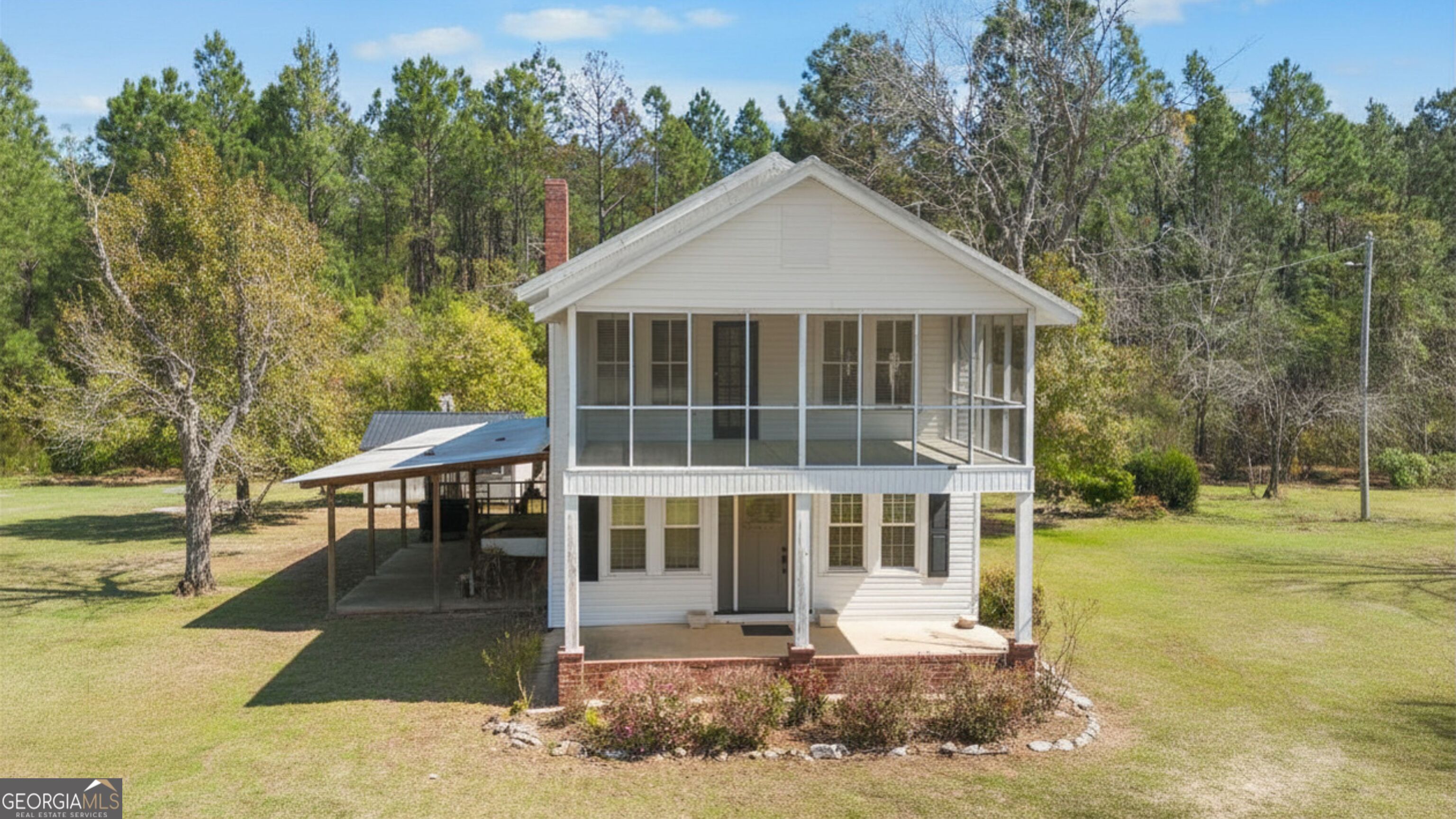 17332 Old River Road North Statesboro, GA 30461 - Photo 2 of 26 a front view of a house with a yard