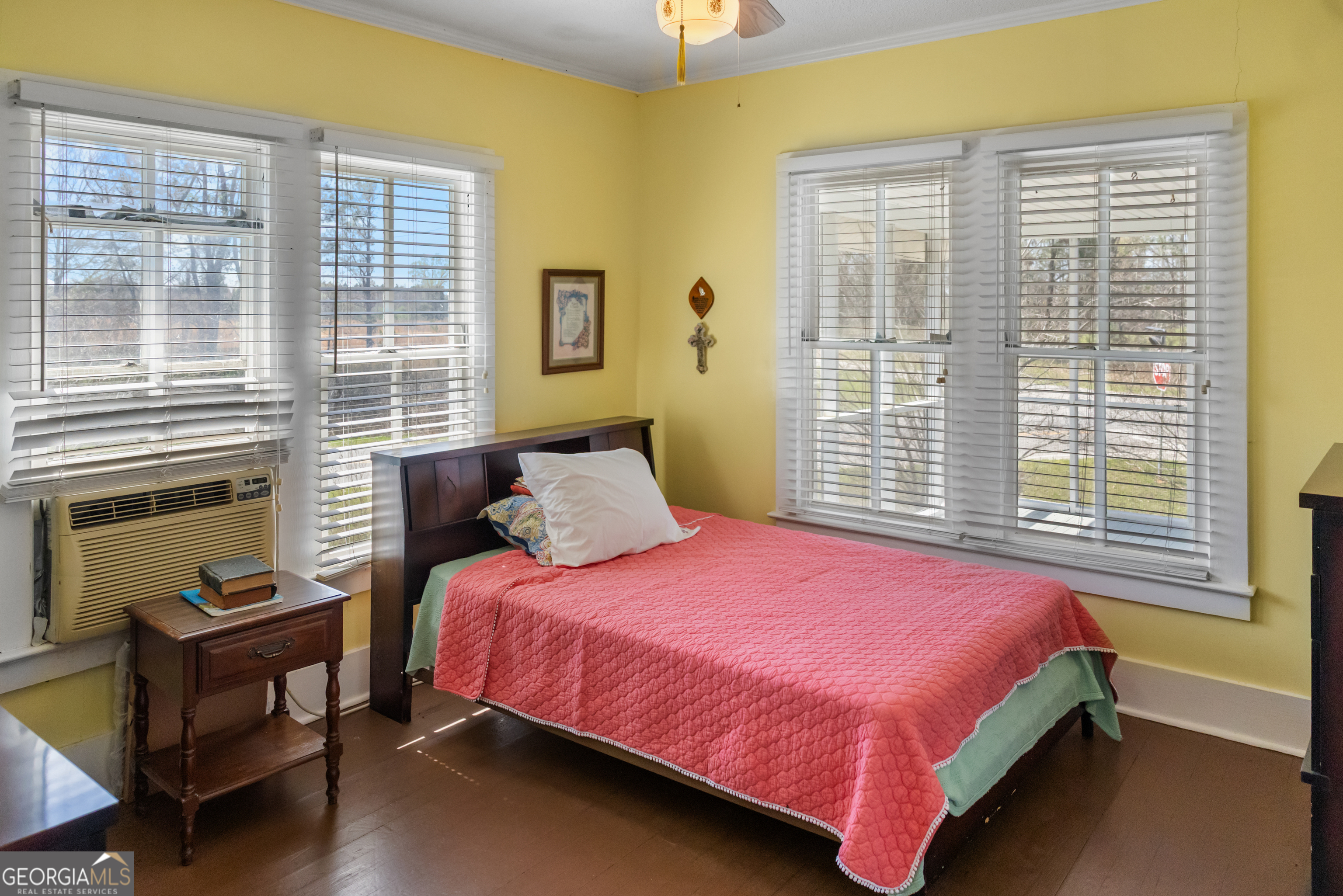 17332 Old River Road North Statesboro, GA 30461 - Photo 24 of 26 a bedroom with a bed chair and a window