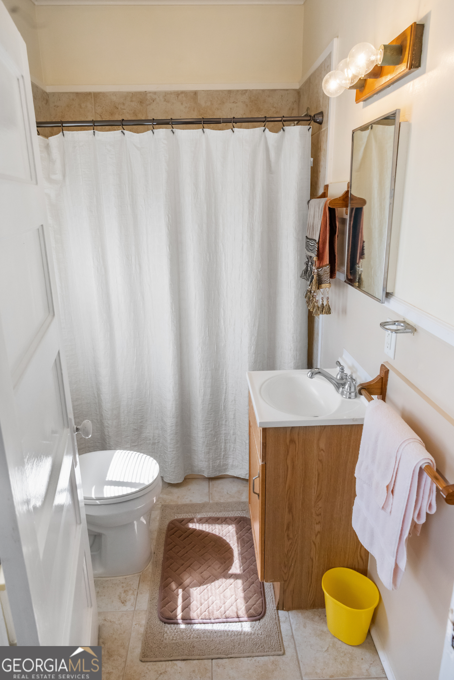 17332 Old River Road North Statesboro, GA 30461 - Photo 25 of 26 a bathroom with a sink and toilet