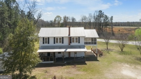 17332 Old River Road North Statesboro, GA 30461 - Photo 26 of 26 a front view of a house with a yard